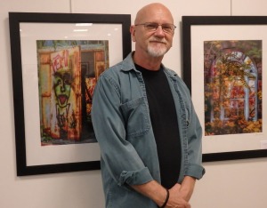 George Garbeck with two of his photographs